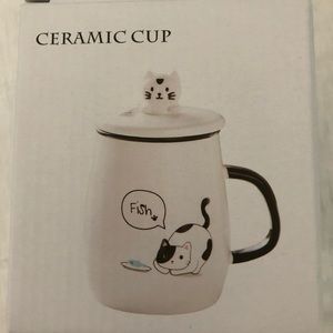 Ceramic cup with spoon